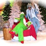 Grinch and Jack Frost characters on stage