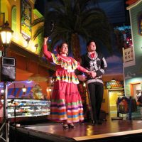 Dancing performers on stage at event in Chicago, IL