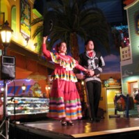 Dancing performers on stage at event in Chicago, IL